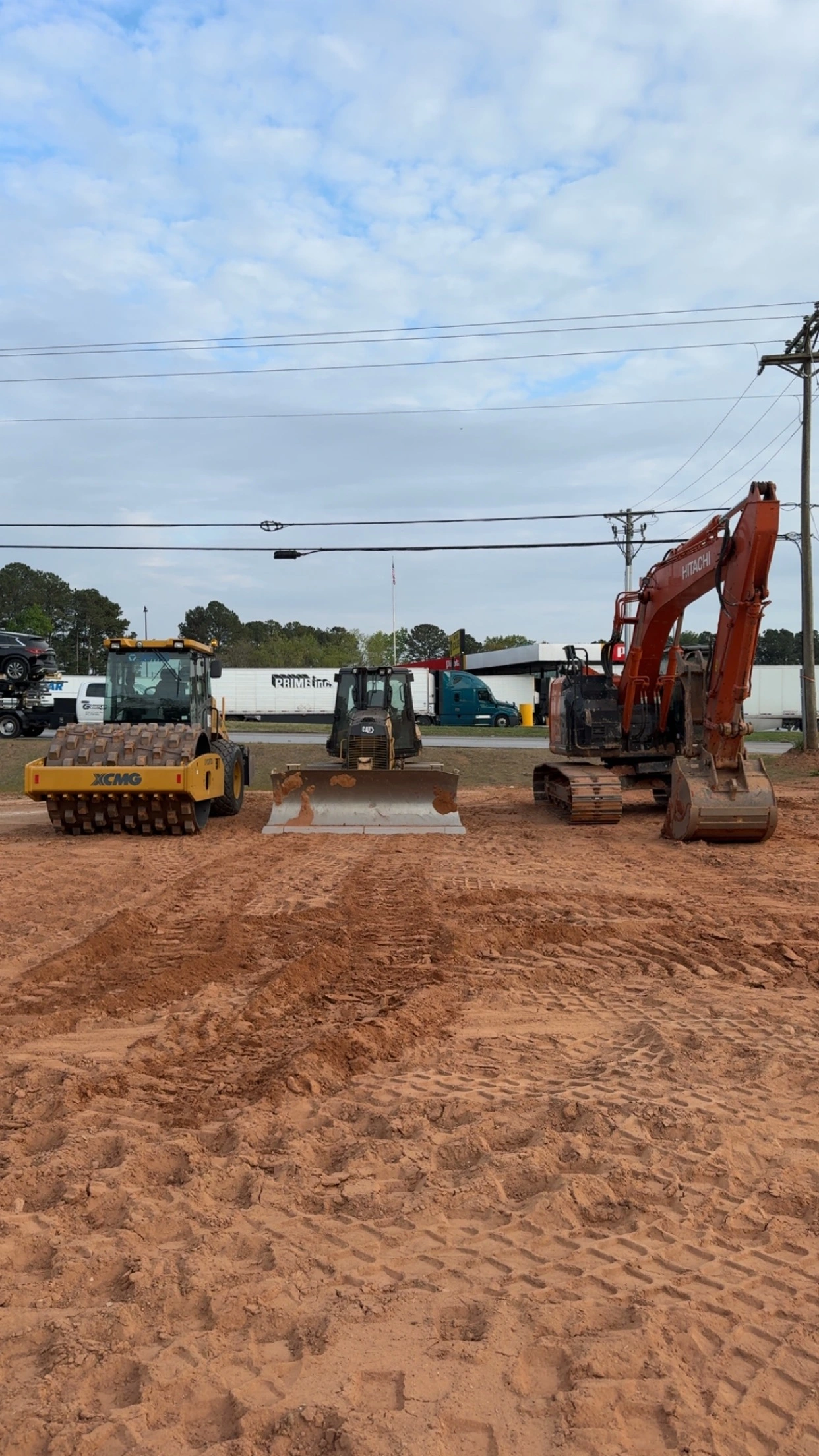 Excavator digging for construction site prep near Aragon Georgia